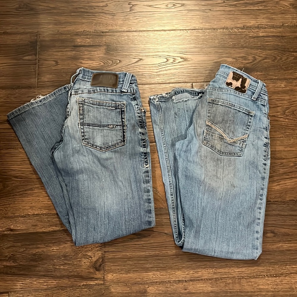 Two pair of jeans. Reclaim by Buckle and Ariat